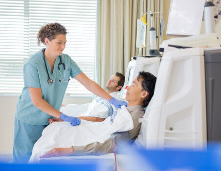 nurse taking care dialysis patients