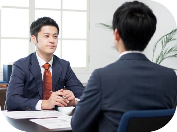 man talking to his co-worker