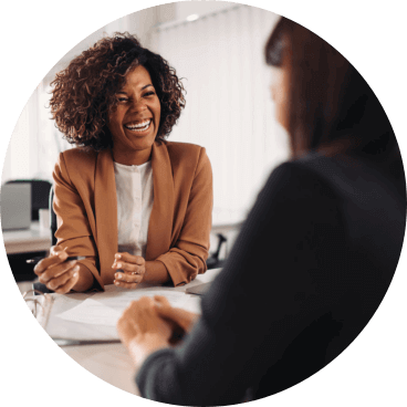 woman sitting talking to his client
