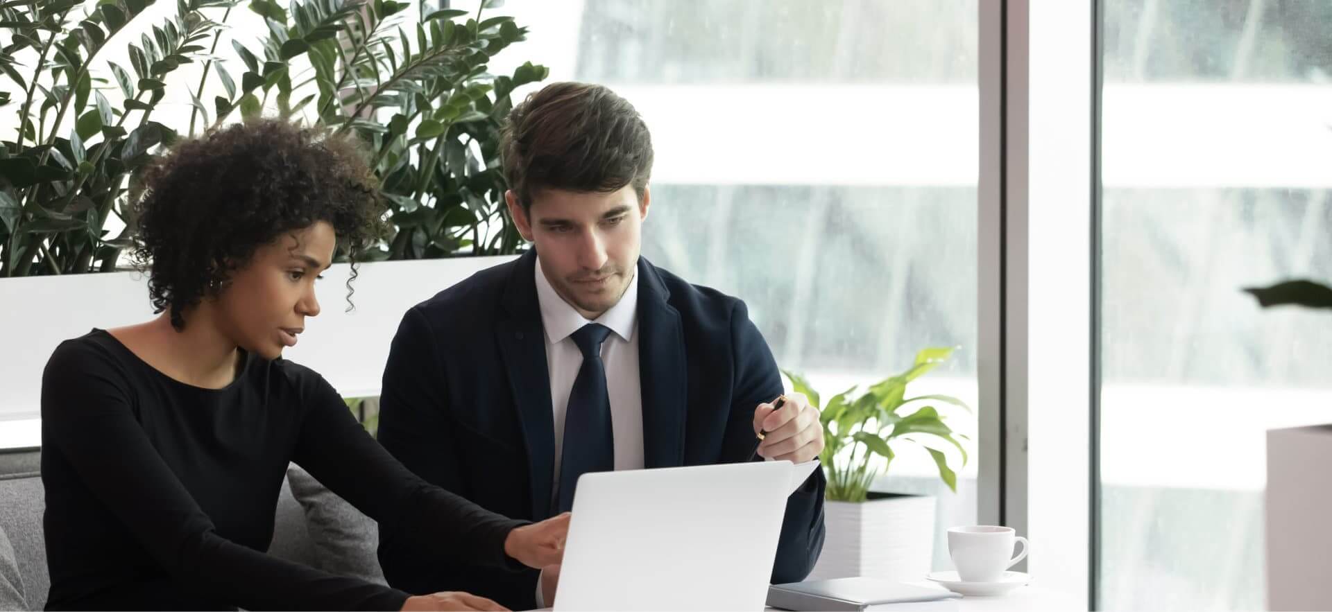 busy man and woman talking about business
